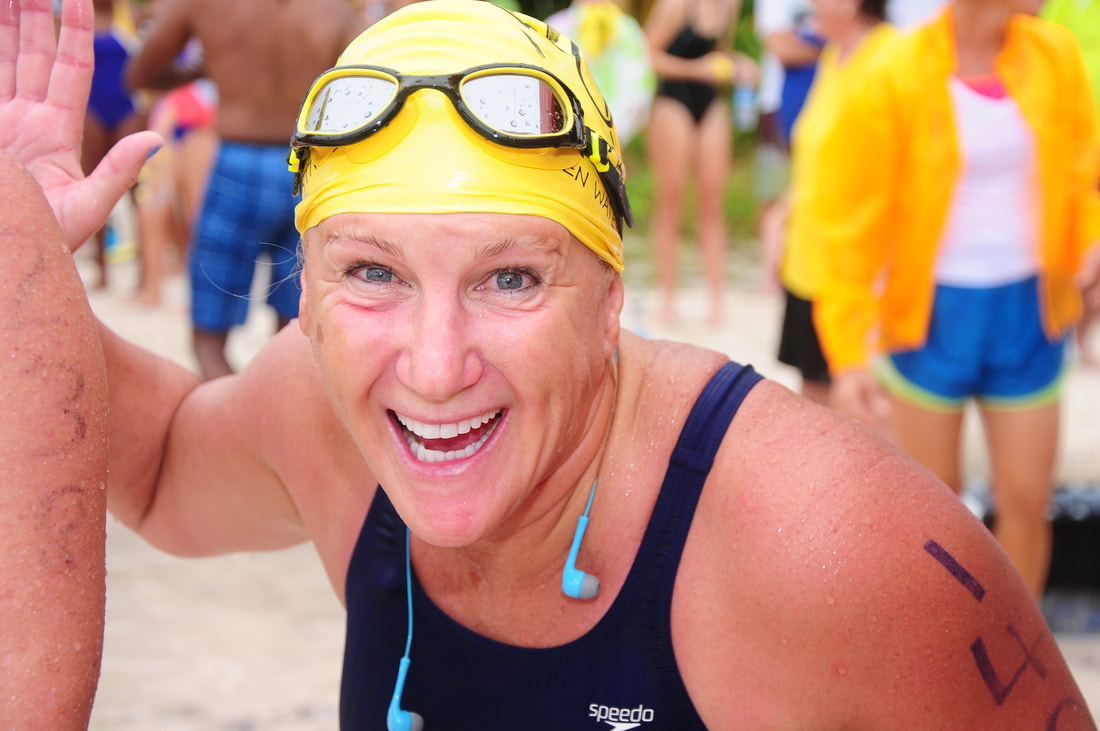 Happy swimmer at Barbados Open Water Festival